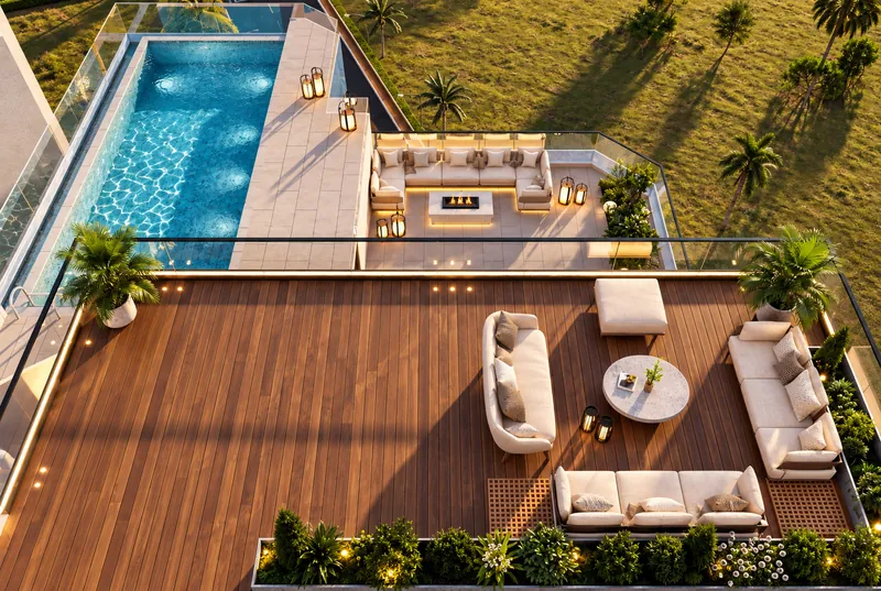 Terrace deck with outdoor seating beside the pool, seen from above